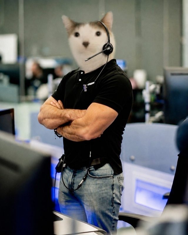 CET working at a support desk with a headset